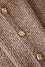 Sweater with buttons on the sleeves